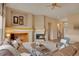 Spacious living room with a fireplace and open layout at 1001 Deer Clover Way, Castle Pines, CO 80108