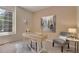 Bright office with a modern desk, chair, and a city themed art piece at 1001 Deer Clover Way, Castle Pines, CO 80108