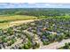 Aerial view showcasing the community, houses, and neighborhood at 9821 Bucknell Ct, Highlands Ranch, CO 80129