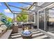 Inviting back deck with a fire pit and cozy seating area at 9821 Bucknell Ct, Highlands Ranch, CO 80129