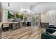 Basement theater area with a large screen, comfortable seating, and fireplace at 9821 Bucknell Ct, Highlands Ranch, CO 80129