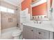 Recently renovated bathroom featuring a tub with shower and modern vanity at 9821 Bucknell Ct, Highlands Ranch, CO 80129
