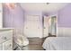 Third bedroom offering closet, lighting and easy access to hallway and adjacent rooms at 9821 Bucknell Ct, Highlands Ranch, CO 80129