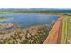 Scenic view of a serene lake surrounded by natural landscapes at 9821 Bucknell Ct, Highlands Ranch, CO 80129