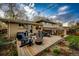 Charming backyard with a spacious deck, comfortable seating, and well-maintained landscaping at 1140 S Dover St, Lakewood, CO 80232