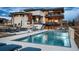 Modern home featuring a refreshing pool, outdoor kitchen, dining and multiple lounge areas for ultimate outdoor enjoyment at 5140 S Kearney Ct, Greenwood Village, CO 80111