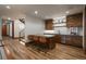 A modern bar area with seating and cabinets, perfect for entertaining at 5140 S Kearney Ct, Greenwood Village, CO 80111