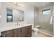 Modern bathroom with a glass shower, sleek vanity, and contemporary fixtures for a spa-like experience at 5140 S Kearney Ct, Greenwood Village, CO 80111