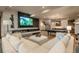Open living room with fireplace, TV, pool table, and modern finishes at 5140 S Kearney Ct, Greenwood Village, CO 80111