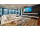 Modern living room with a fireplace, TV, and a comfortable sectional sofa at 5140 S Kearney Ct, Greenwood Village, CO 80111