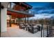 Spacious covered patio features ample seating, an outdoor dining area, and scenic views of the surrounding landscape at 5140 S Kearney Ct, Greenwood Village, CO 80111