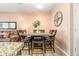 Dining area with a square table and four chairs at 833 E 98Th Ave # 204, Thornton, CO 80229
