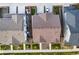 Aerial view of the home's roof, landscaping, and proximity to neighboring houses at 21413 E 59Th Pl, Aurora, CO 80019