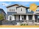 Charming two-story home with gray and blue siding, front porch, and 3.75% interest rate available at 21413 E 59Th Pl, Aurora, CO 80019