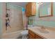 Functional bathroom with tub, shower, toilet, and sink with vanity, providing essential amenities at 4550 E 121St Pl, Thornton, CO 80241