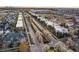 Aerial view of a residential neighborhood with tree-lined streets and sidewalks at 8071 E 29Th Ave, Denver, CO 80238