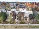 Aerial view of modern townhomes with rooftop decks in a neighborhood setting at 8071 E 29Th Ave, Denver, CO 80238