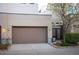 Attached two-car garage with a private entrance, offering convenience and security at 8071 E 29Th Ave, Denver, CO 80238