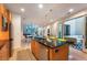 Modern kitchen with stainless steel appliances, granite counters, and an open layout at 8071 E 29Th Ave, Denver, CO 80238