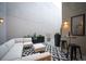 Chic outdoor space featuring modular seating, planters, and a small dining area for a relaxing ambiance at 8071 E 29Th Ave, Denver, CO 80238