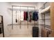 Bright walk-in closet with metal shelving and racks to hang your clothes at 8071 E 29Th Ave, Denver, CO 80238