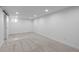 Spacious basement with recessed lights and neutral carpeting at 2485 S Fillmore St, Denver, CO 80210