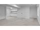 Finished basement area with custom cabinets and countertop space, perfect for entertaining at 2485 S Fillmore St, Denver, CO 80210