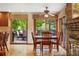 Bright dining area with views of the backyard through sliding glass doors at 5812 Irish Pat Murphy Dr, Parker, CO 80134