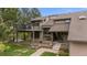 Charming home exterior featuring a balcony, mature trees, and landscaped front yard at 5812 Irish Pat Murphy Dr, Parker, CO 80134