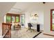 Bright home office features a modern desk, natural light from the window, and stylish decor at 5812 Irish Pat Murphy Dr, Parker, CO 80134