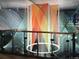 Stunning interior art installation featuring colorful, suspended threads and illuminated accents, adding a modern touch to the space at 1750 Wewatta St # 1501, Denver, CO 80202