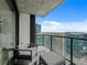 Private balcony with comfortable seating and stunning city views, perfect for relaxing and entertaining at 1750 Wewatta St # 1501, Denver, CO 80202