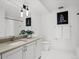 Modern bathroom featuring neutral vanity and hexagonal tile floors at 1750 Wewatta St # 1501, Denver, CO 80202