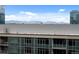 City views of the building from the living room of a high rise apartment at 1750 Wewatta St # 1501, Denver, CO 80202