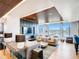 A warm and inviting resident lounge with a fireplace, city views and comfortable seating at 1750 Wewatta St # 1501, Denver, CO 80202