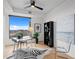 Contemporary office space with desk, zebra rug and city view at 1750 Wewatta St # 1501, Denver, CO 80202