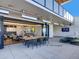 Enjoy the seamless indoor/outdoor experience with folding doors leading to an outside seating area and dining at 1750 Wewatta St # 1501, Denver, CO 80202