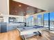 Relax in the recreation room with a stunning view, a pool table and wood accents at 1750 Wewatta St # 1501, Denver, CO 80202