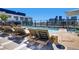 Inviting rooftop pool area with cozy lounge chairs and cityscape views, ideal for relaxation and enjoyment at 1750 Wewatta St # 1501, Denver, CO 80202