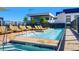 Relaxing rooftop pool area with comfortable lounge chairs and a hot tub, perfect for unwinding with a view at 1750 Wewatta St # 1501, Denver, CO 80202