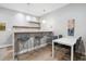 Stylish bar area features modern seating, a countertop with a sink, and decorative pendant lights at 8565 E 50Th Dr, Denver, CO 80238