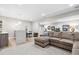 Basement area combines a wet bar with a living space, perfect for entertaining or relaxing at 8565 E 50Th Dr, Denver, CO 80238