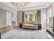 Cozy living room with neutral colors and hardwood floors at 8565 E 50Th Dr, Denver, CO 80238