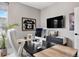 Functional home office featuring a large desk, comfortable chair, ample space, and sleek decor at 15020 Cast Pebble Cir, Parker, CO 80134