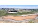 Panoramic aerial view of the community, highlighting amenities like a pool and horse park at 1041 W Witherspoon Dr, Elizabeth, CO 80107