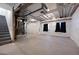 Unfinished basement with concrete floor, exposed ceiling and covered walls at 1041 W Witherspoon Dr, Elizabeth, CO 80107