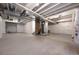 Unfinished basement offering a large space, exposed ductwork and foundation, ready for customization at 1041 W Witherspoon Dr, Elizabeth, CO 80107