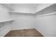 Walk-in closet with shelving for storage and organization at 1041 W Witherspoon Dr, Elizabeth, CO 80107
