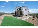 Charming two-story home with a covered porch and fresh landscaping at 1041 W Witherspoon Dr, Elizabeth, CO 80107