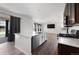Spacious kitchen featuring stainless steel appliances, a center island, and an open floor plan at 1041 W Witherspoon Dr, Elizabeth, CO 80107